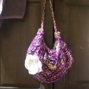 Handmade purple knit bag with faux fur lining